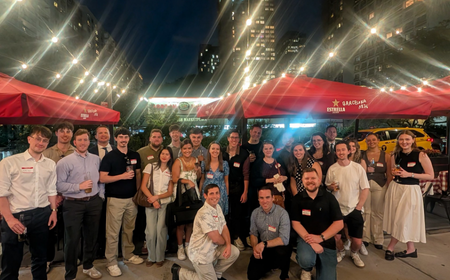UCD alumni community in New York posing for a group photo.